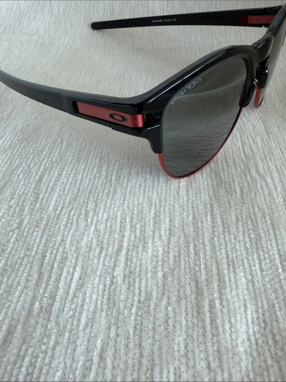 Oakley Latch Key Black and Red Round Frame Sunglasses